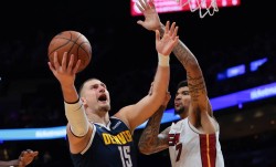 约基奇21+5+8伤退 热火8人得分上双胜掘金